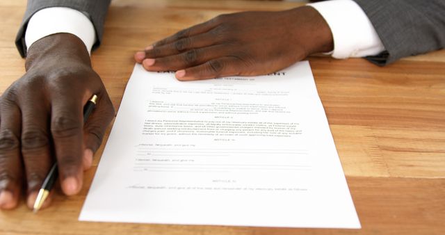 Businessman Reviewing Contract Agreeing Legal Terms - Download Free Stock Images Pikwizard.com