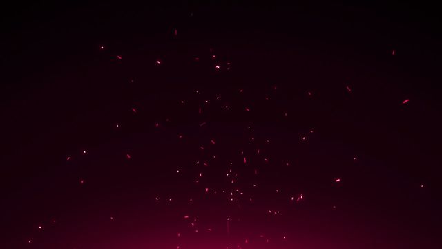 Red particles in motion against a black background create a mystical and atmospheric effect. This visual is suitable for use in digital designs, backgrounds for events, presentations, themes related to magic or mystery, and as a visual effect in motion graphics projects.