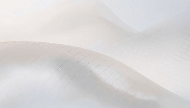 Pearlescent undulating tessellated surface with faint grid lines minimal curvature