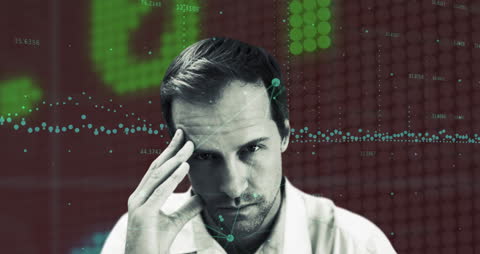 Stressed Man Analyzing Data with Graph Overlay