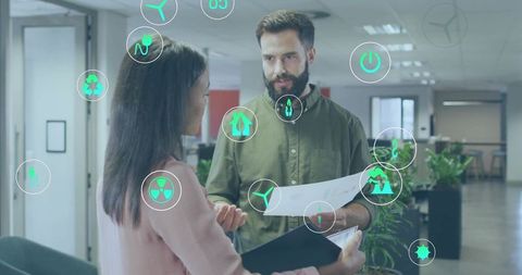 Business Meeting Collaboration with Eco-Friendly Focus in Modern Office