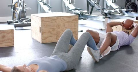 Man and Woman Doing Medicine Ball Exercises at Gym - Download Free Stock Images Pikwizard.com