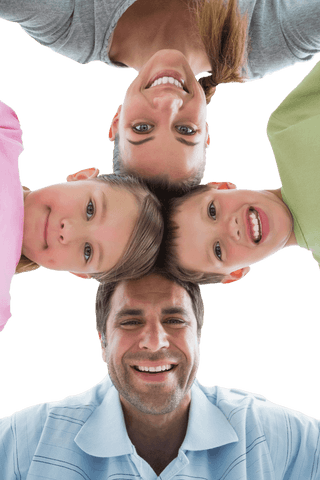 Transparent family smiling cheerfully from below