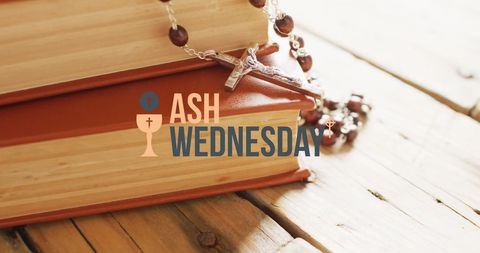 Ash wednesday bible and rosary on wooden surface