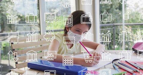 Masked schoolgirl doing homework in outdoor classroom