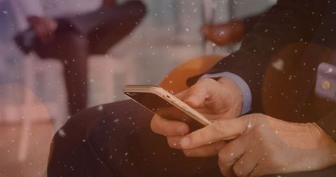 Businessman Using Smartphone with Abstract Snow Effect - Download Free Stock Images Pikwizard.com