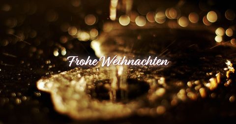 Frohe Weihnachten Christmas Wishes with Golden Liquid