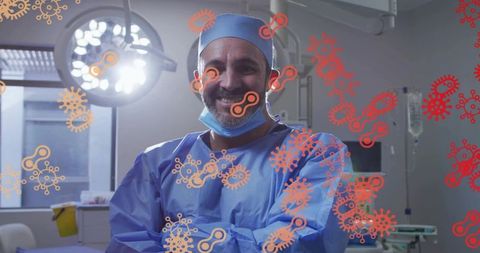 Smiling surgeon standing in operating room wearing scrubs with virus graphic overlay