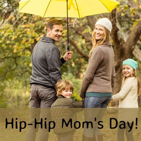 Cheerful Family Celebrating Mother's Day Outdoors