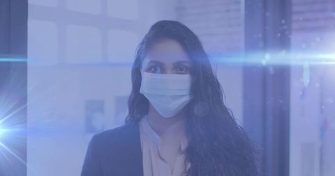 Businesswoman Wearing Face Mask in Modern Office Environment