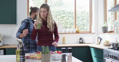 Diverse Couple Cooking and Enjoying Smoothies in Modern Kitchen - Download Free Stock Images Pikwizard.com