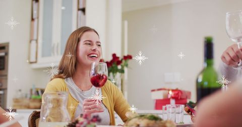 Joyful Family Christmas Dinner with Snowfall Effect - Download Free Stock Images Pikwizard.com