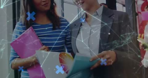 Two Businesswomen Collaborating with Digital Technology Concept