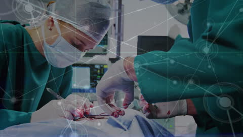 Surgeons Operating in High-Tech Healthcare Environment