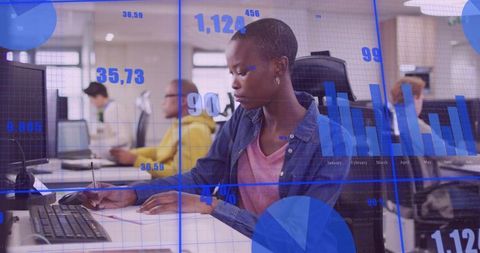 Professional Woman Analyzing Data in Modern Office Workspace