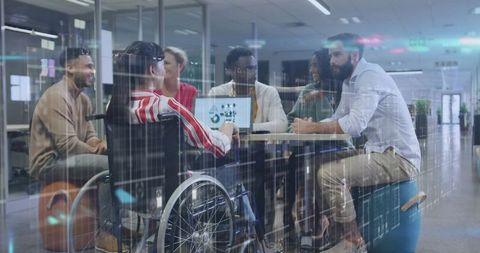 Diverse Team Collaborating in Modern Office Setting on New Project