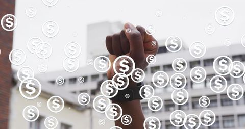 Confident Woman Raising Fist with Dollar Symbols and Smartwatch