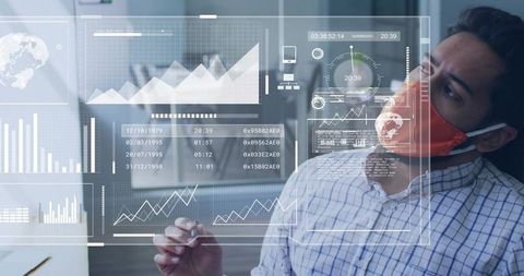 Business analyst wearing red mask interacting with augmented reality analytics dashboards