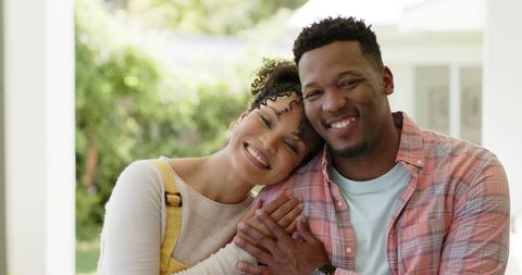 Happy Couple Embracing Outdoors in Sunny Garden - Download Free Stock Images Pikwizard.com