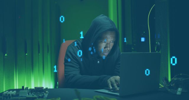Hooded man focusing on laptop screen while binary codes float around him, suggesting a scene of hacking or intensive data analysis. Ideal for use in contexts related to cybersecurity, hacking, computer science education, IT infrastructure, data protection, or technology-focused articles.