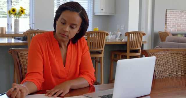 Focused African American Woman Working from Home on Laptop - Download Free Stock Images Pikwizard.com