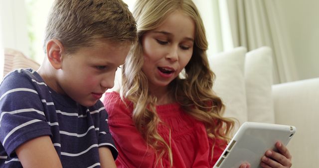 Two Children Engaged in Educational Tablet Activity - Download Free Stock Images Pikwizard.com