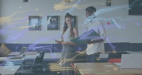 Colleagues Collaborating with Augmented Reality Overlay in Modern Coworking Space