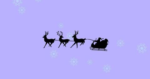 Santa and reindeer silhouette in violet night sky