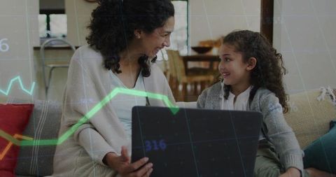 Mother Daughter Collaborating on Laptop with Data Chart Overlay, Cozy Home Learning Moment