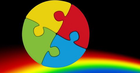 Colorful Puzzle Pieces Over Vibrant Rainbow Background