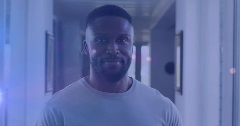 Happy Man Smiling in Modern Blue-Toned Light