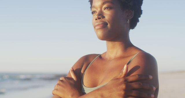 Confident Young Woman Enjoying Peaceful Beach Moment - Download Free Stock Images Pikwizard.com