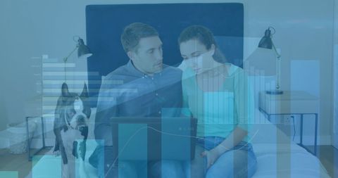 Couple Analyzing Financial Data Together at Home