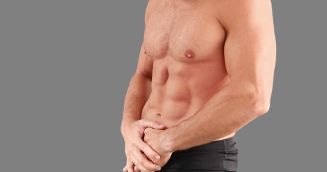 Fit Man Touching Stomach with Pain Expression Isolated on Gray Background - Download Free Stock Images Pikwizard.com