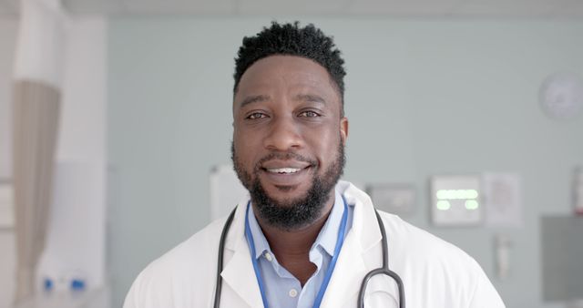 Smiling African American Doctor in Hospital with Stethoscope - Download Free Stock Images Pikwizard.com