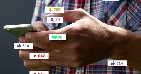 Tapping smartphone displaying social notifications, likes, comments, followers, alerts