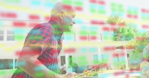 Poolside grilling host in plaid shirt and striped apron holding skewers with colorful overlay