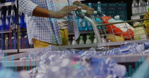 Shopper pushing cart loading groceries on checkout conveyor with retail data overlay