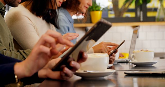 People Using Technology Devices in Cafe, Enjoying Lattes - Download Free Stock Images Pikwizard.com