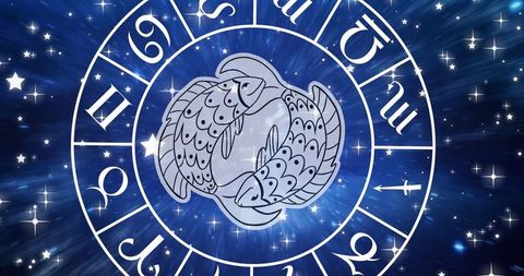 Pisces symbol in celestial zodiac wheel with stars