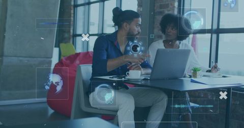 Team collaborating on digital innovations with futuristic interface