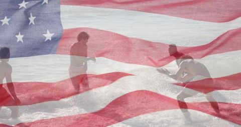 Friends wading in ocean with patriotic american flag overlay on sunny beach
