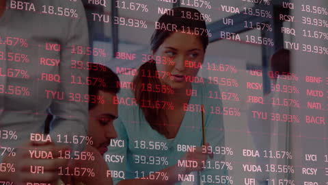 Multiracial Team Analyzing Stock Market Data in Modern Office