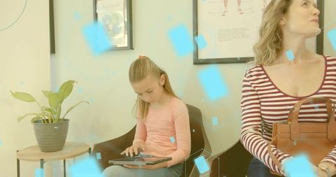 Girl using tablet in clinic waiting room, mother holding handbag, family healthcare