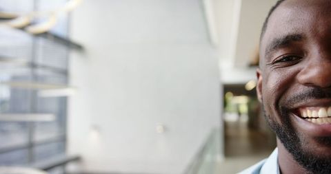 Confident African American Business Professional Smiling in Modern Office