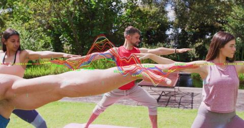 Group practicing outdoor yoga warrior pose with colorful data waveform overlay