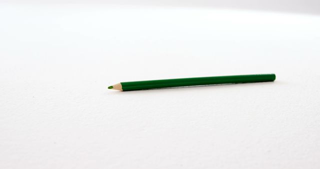 Green Colored Pencil on White Background - Download Free Stock Images Pikwizard.com