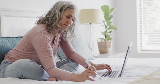 Mature Woman Working on Laptop from Home - Download Free Stock Images Pikwizard.com