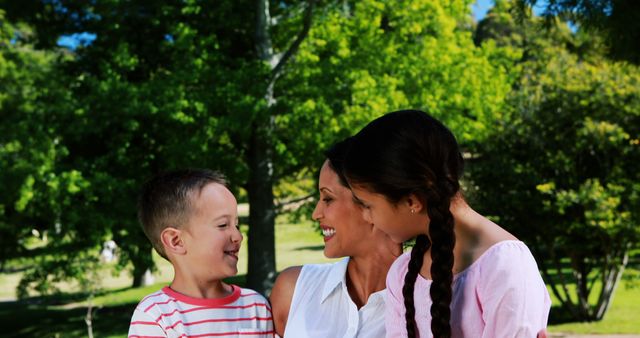 Mother Spending Quality Time With Children Outdoors in Park - Download Free Stock Images Pikwizard.com