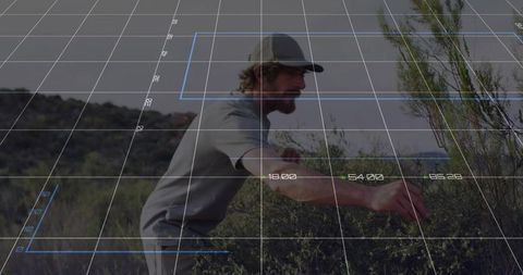 Explorer reaching in wild terrain with digital grid overlay